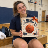 Basketball player holding the closed calendar after practice